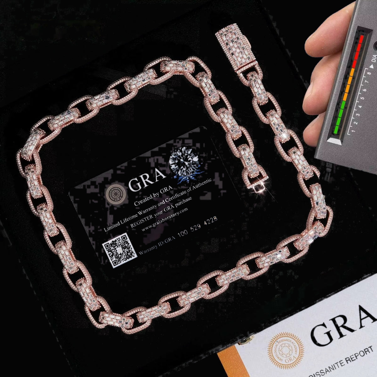 Infinity 13mm moissanite Cuban link chain shown with diamond tester