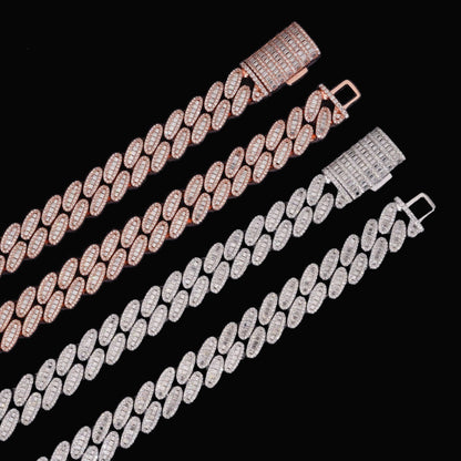 Baguette 15mm moissanite Cuban link chains in silver and rose gold on a black background