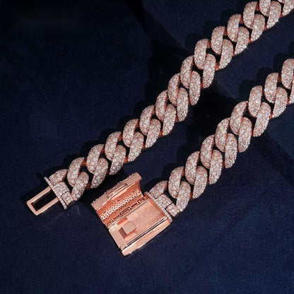 Baguette 21mm moissanite Cuban link chain in Rose Gold with open clasp on navy velvet