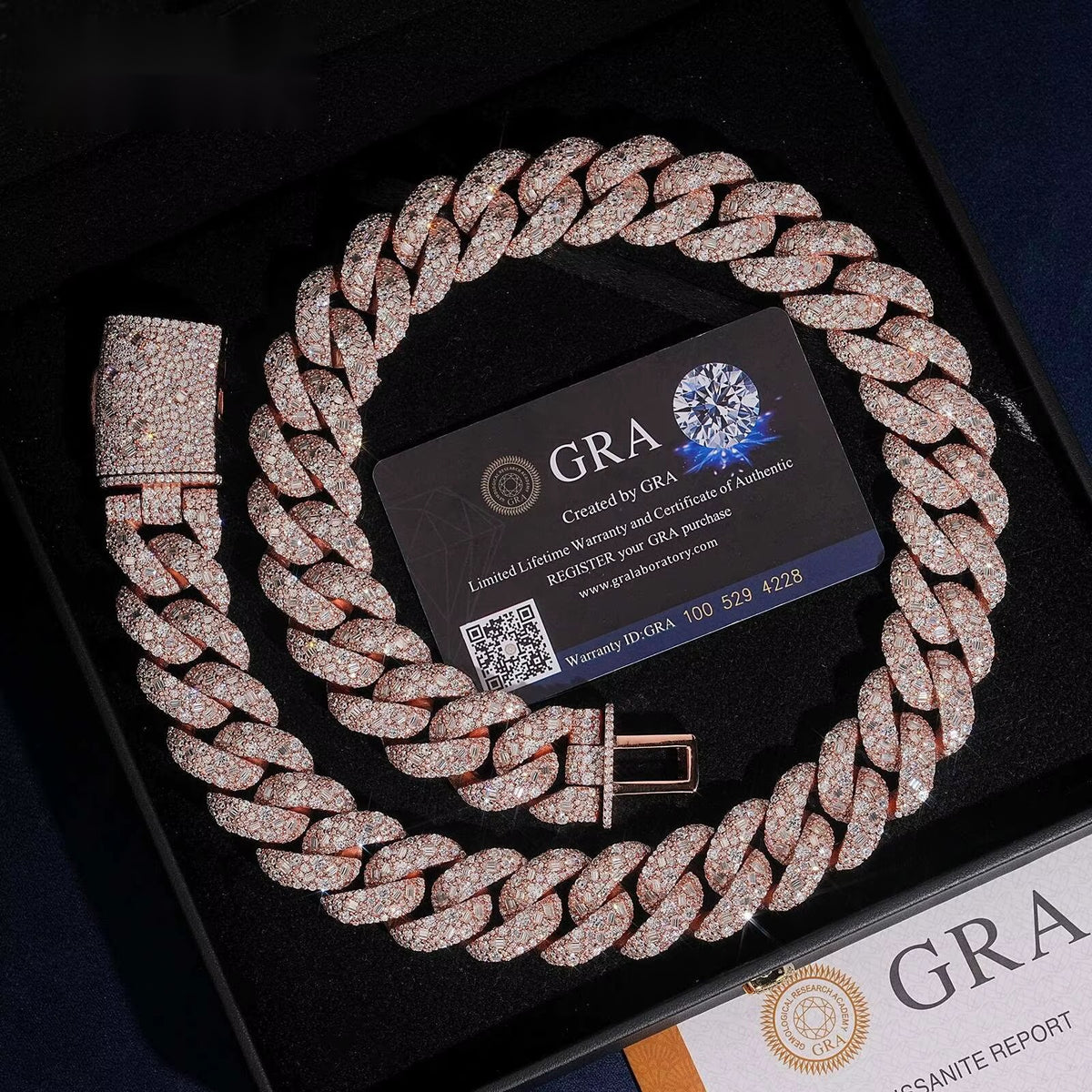 Baguette 21mm moissanite Cuban link chain in Rose Gold displayed on black velvet