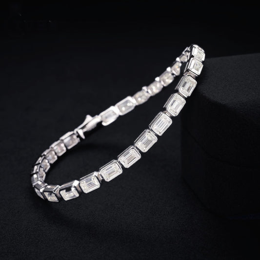 Emerald-cut 5mm moissanite tennis bracelet in Silver on a black noir background