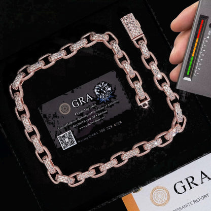 Infinity 13mm moissanite Cuban link bracelet shown with a diamond tester on black