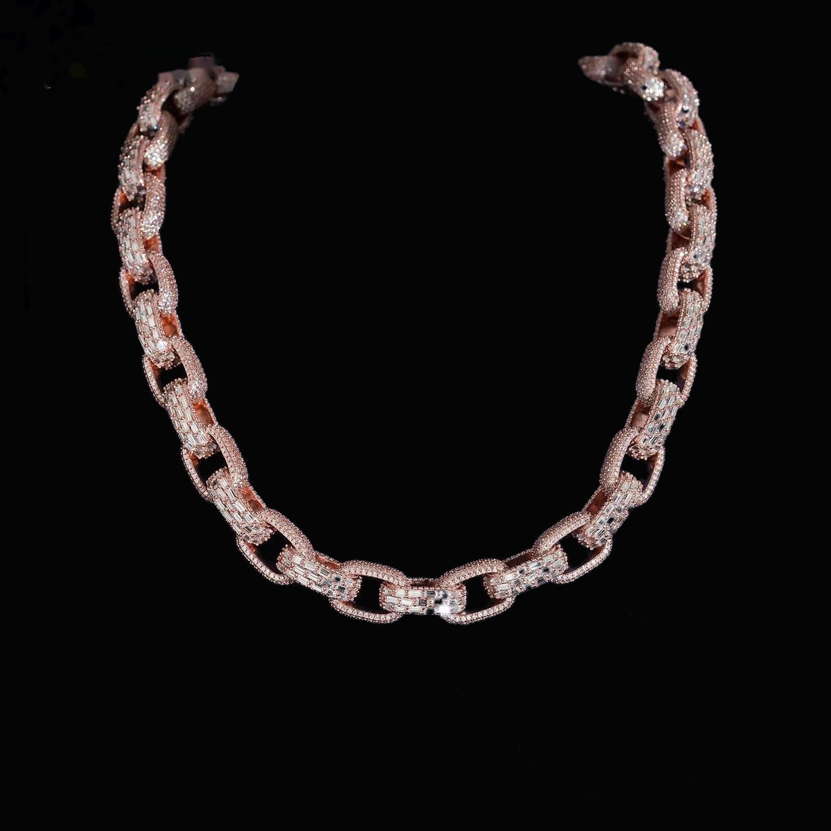Infinity 13mm moissanite Cuban link chain in rose gold displayed on black