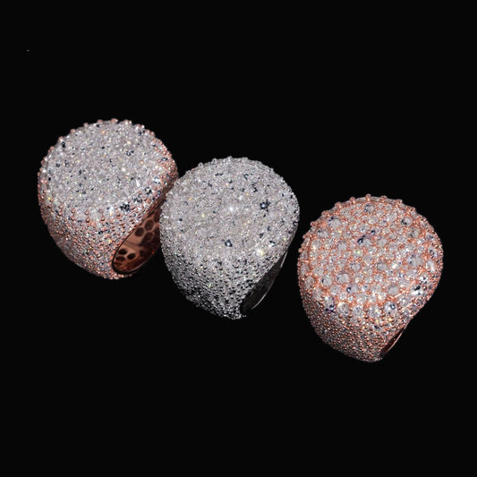 Reverse-set moissanite rings in silver, rose gold, and two-tone finishes shown at an angle