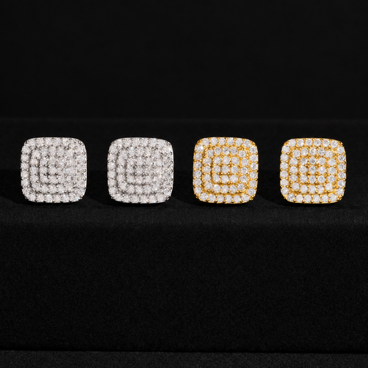 Square moissanite screw-back stud earrings in silver and gold on a black background