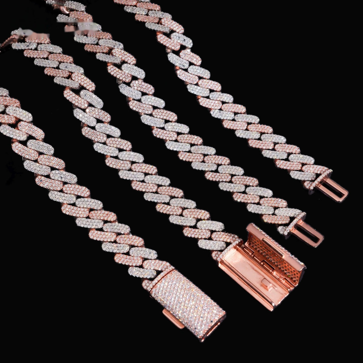 Two-tone 16mm moissanite Cuban link bracelet with clasp detail on a black background