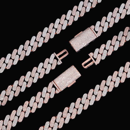 Tri-row 16mm moissanite Cuban link chain in two-tone finish with clasp detail on black