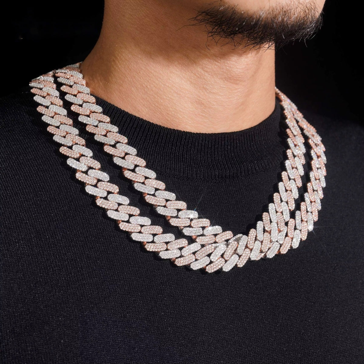 Tri-row 16mm moissanite Cuban link chain in two-tone finish worn on neck